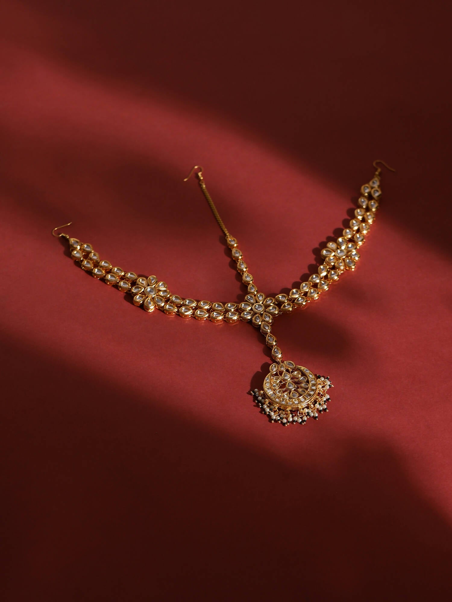 Gold-Polished White Kundan-Studded Pearl Beaded Matha Patti - Ruby Raang | Grab2Buy