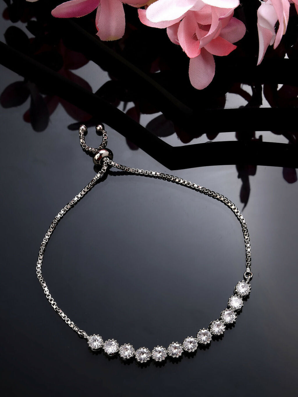 NVR Women Silver-Plated Handcrafted American Diamond Link Bracelet | Grab2Buy