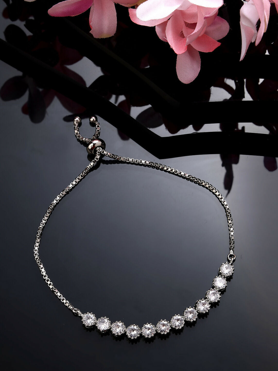 NVR Women Silver-Plated Handcrafted American Diamond Link Bracelet | Grab2Buy