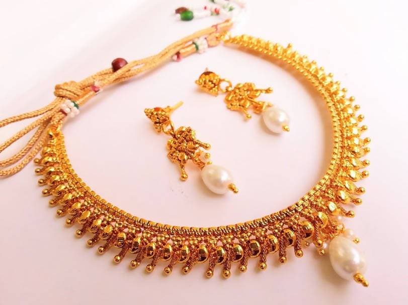 Amazing metallic Necklace Set with pearl drops | Grab2Buy
