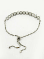NVR Women Silver-Plated Handcrafted American Diamond Link Bracelet | Grab2Buy