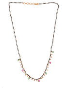 Jewels Nest Elegant Black Beads Mangalsutra with Green & Red Stone Drops – Silver Finish
