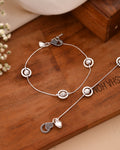 Jewels Nest Orbit Glow Silver Anklet With Circular Disc Accents And Heart Toggle Closure | Grab2Buy