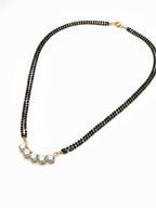 NVR Women Gold Plated Black Beaded Mangalsutra | Grab2Buy