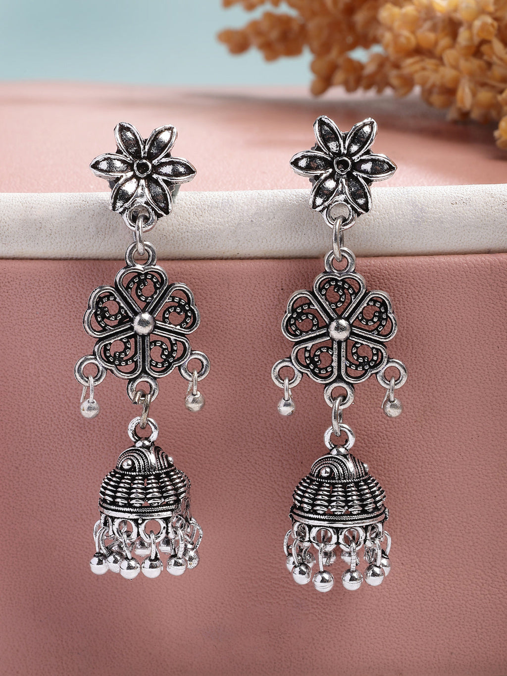 NVR Women Silver Toned Oxidized Floral Design Jhumka Earrings | Grab2Buy