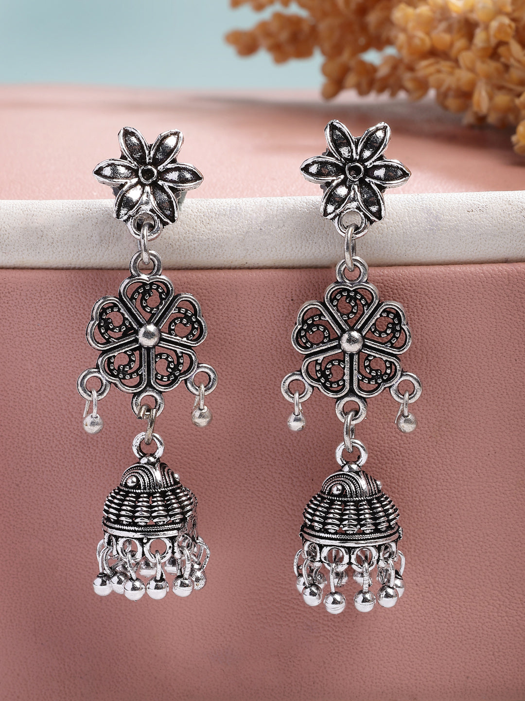 NVR Women Silver Toned Oxidized Floral Design Jhumka Earrings | Grab2Buy
