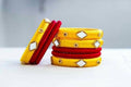 Yellow and Red Silk Threaded Bangles Set of 2 | Grab2Buy