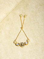Women's Gold-Polished White Brass Kundan Charm Bracelet - Ruby Raang | Grab2Buy
