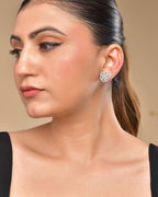 VOJ Silver Plated Floral Shape Ad Stone Studded Studs Earrings | Grab2Buy