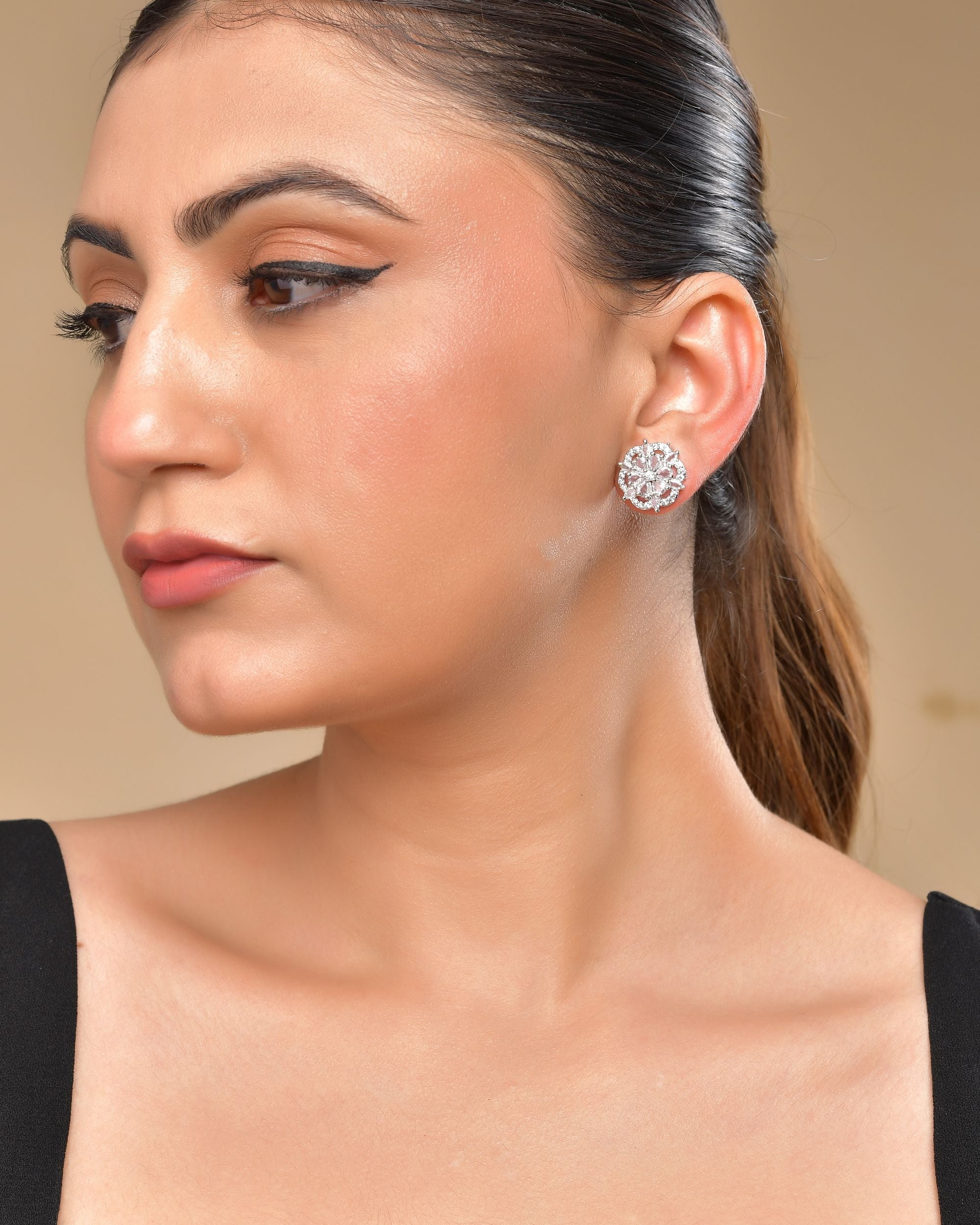 VOJ Silver Plated Floral Shape Ad Stone Studded Studs Earrings | Grab2Buy