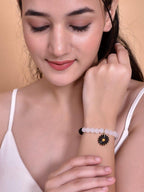 VOJ Black White Beads Black Flower Elastic Bracelet | Grab2Buy