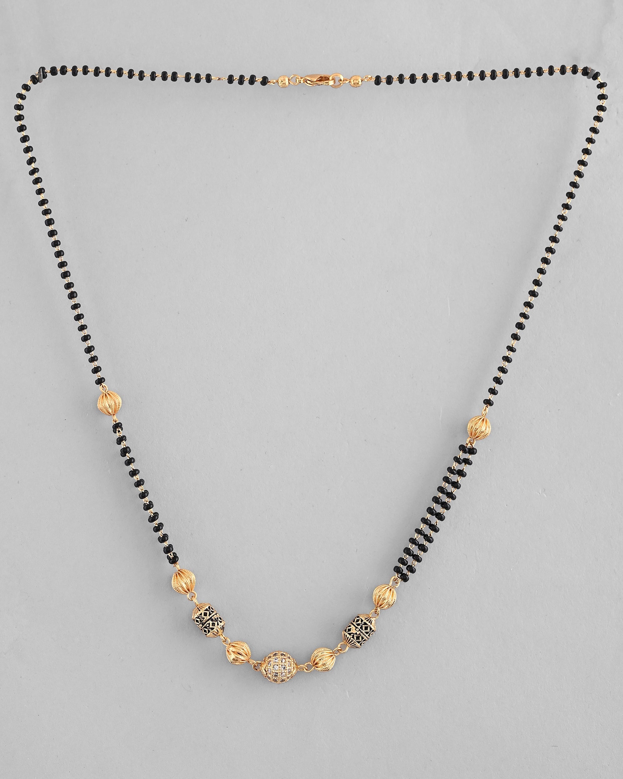 VOJ Gold-Polished Stone Studded Cricular shaped Mangalsutra