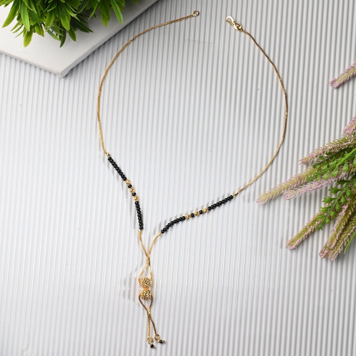 AanyaCentric Gold-Polished Jewelry Combo: Elegant Short Mangalsutra, Finger Ring, and American Diamond Earrings Set | Grab2Buy