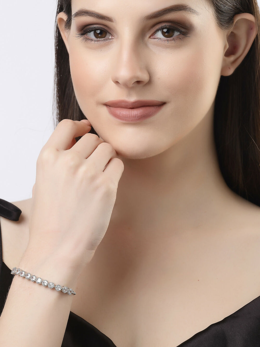 NVR Women Silver-Plated Handcrafted American Diamond Link Bracelet | Grab2Buy
