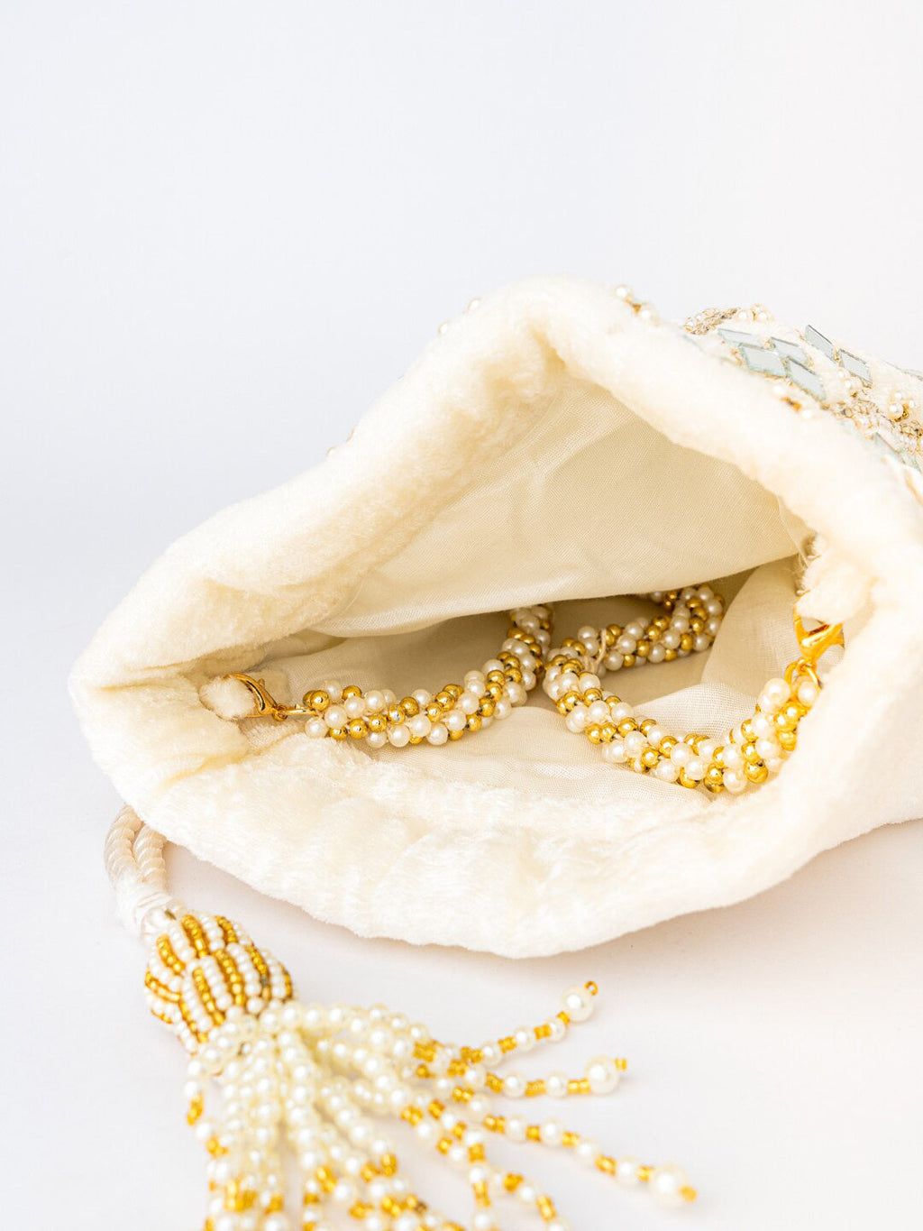NR By Nidhi Rathi White Mirror Work Embroidered Potli Clutch | Grab2Buy