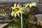 Gold-Polished Alloy Black Rhinestones Studded Jhumki Earrings - The Pari | Grab2Buy